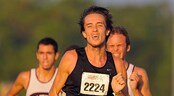 Disney Cross Country Classic Event Three cross-country runners strain as they compete against each other