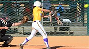 President's Day Weekend Showcase A softball batter warms up in the on-deck circle