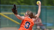 Diamond 9 Sun Classic Fall Showcase A softball pitcher stretches as she throws a softball