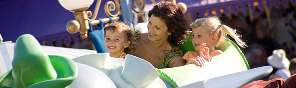 Family Riding Dumbo the Flying Elephant