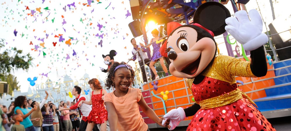Girl Dancing with Minnie Mouse at Celebrate! A Street Party