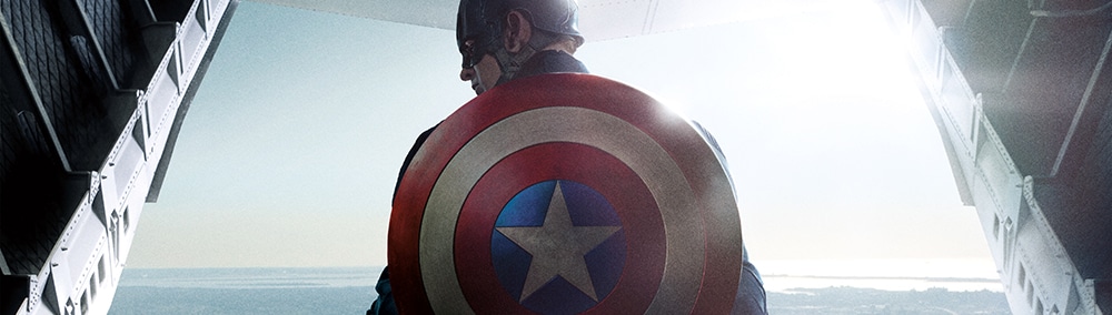 Captain America stands near the rear opening of a cargo jet with his shield strapped to his back. Captain America stands near the rear opening of a cargo jet with his shield strapped to his back.