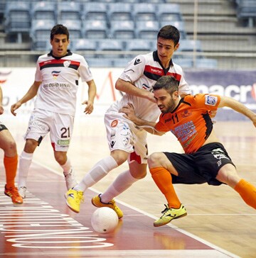 World Futsal Championships Players compete over a ball