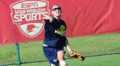 USSSA Slow Pitch World Series Session II A female outfielder throws a softball from the outfield