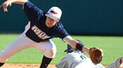USSSA Elite Baseball World Series, Week 1 A runner slides safely into second base before a shortstop can make a play