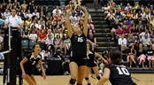 KSA Events Volleyball Classic A volleyball player sets a ball for her teammate during a game