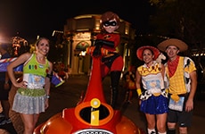 "Toy Story" runners pose with Mrs. Incredible during Disneyland Half Marathon Weekend at Disneyland Resort.