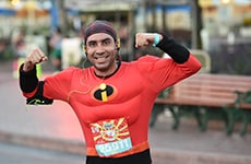 Male runner dressed as Mr. Incredible runs through Disneyland Resort during Disneyland Half Marathon Weekend.