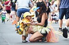 Young runner and parent participate in the runDisney Kids Races during Disneyland Half Marathon Weekend at Disneyland Resort.
