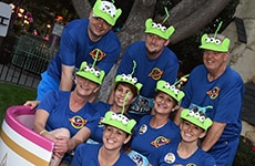 Runners dressed as Pixar's "Toy Story" aliens participate in Disneyland Half Marathon Weekend.
