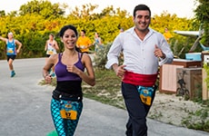 Castaway Cay Challenge participants run the Castaway Cay 5K.