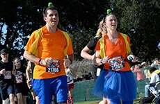 Runners dressed as Goofy run the Walt Disney World Marathon.