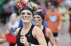 Runner dressed as Minnie Mouse during Walt Disney World Marathon Weekend.
