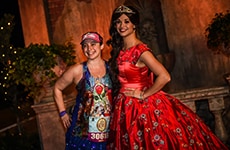 Runner poses with Princess Elena of Avalor during the Disney Princess Enchanted 10K.