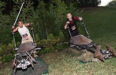 3. Runners pose on Star Wars speeder bikes at the Star Wars 10K during Star Wars Half Marathon – The Dark Side race weekend.