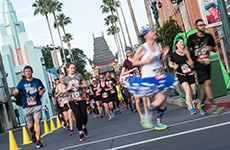 Runners run through Disney's Hollywood Studios during the Star Wars Half Marathon – The Dark Side.