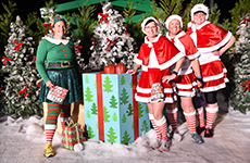 Runners dressed in holiday costumes at Mickey's Holiday 5K at Disney's Animal Kingdom Theme Park