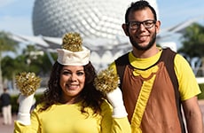 Runners dressed as Lumiere and Cogsworth for Lumiere's Two Course Challenge in Epcot