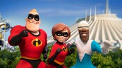 Mr. Incredible, Elastigirl and Frozone pose near Space Mountain