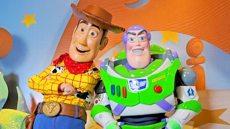 Woody and Buzz Lightyear await Guests of all ages during a Character Greeting experience at Pixar Place