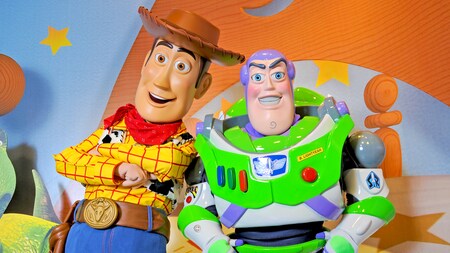 Woody and Buzz Lightyear await Guests of all ages during a Character Greeting experience at Pixar Place