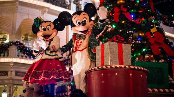 Mickey and Minnie on a holiday float