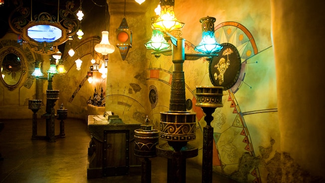 Many lamps hang from the Sorcerer's Workshop ceiling