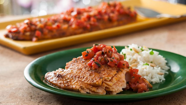 Sample an array of exotic delicious dishes at Tusker House Restaurant, such as the peri-peri marinated baked salmon