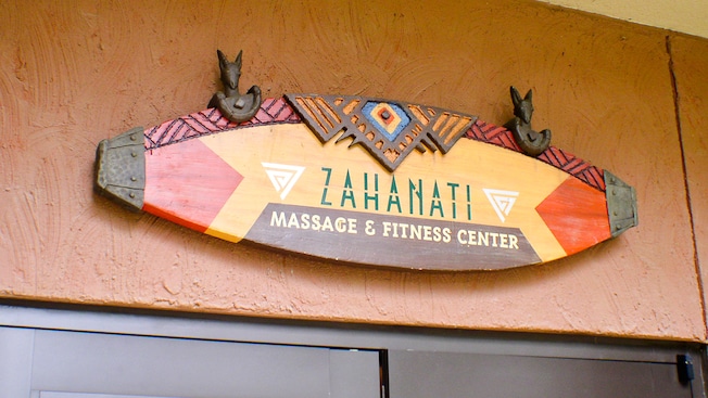 A sign above a set of doors reads: Zahanati Massage & Fitness Center