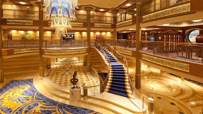 Descend a flowing staircase into the ship’s swirling Art Nouveau accents, imagining you are royalty.
