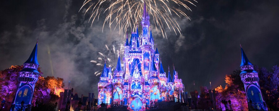 A fireworks show occurring above Cinderella Castle