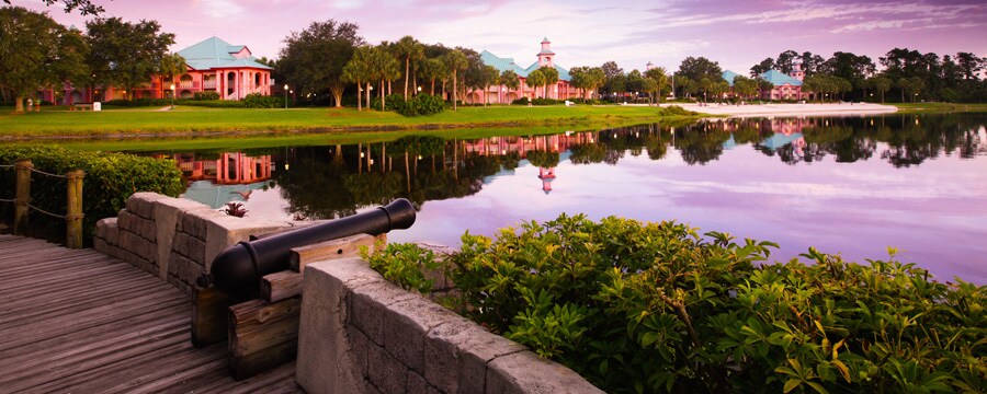 Disney's Caribbean Beach Resort seen across Barefoot Bay at sunset